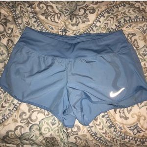 Blue nike running shorts